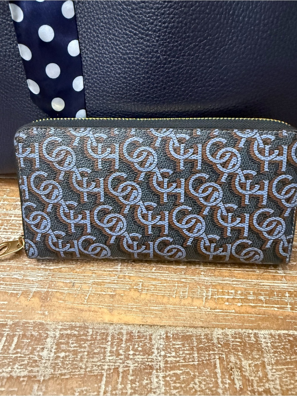 NWOT CH Monogram Zip Around Wallet in Blue-Brown Print, 4” x 7 1/2”.